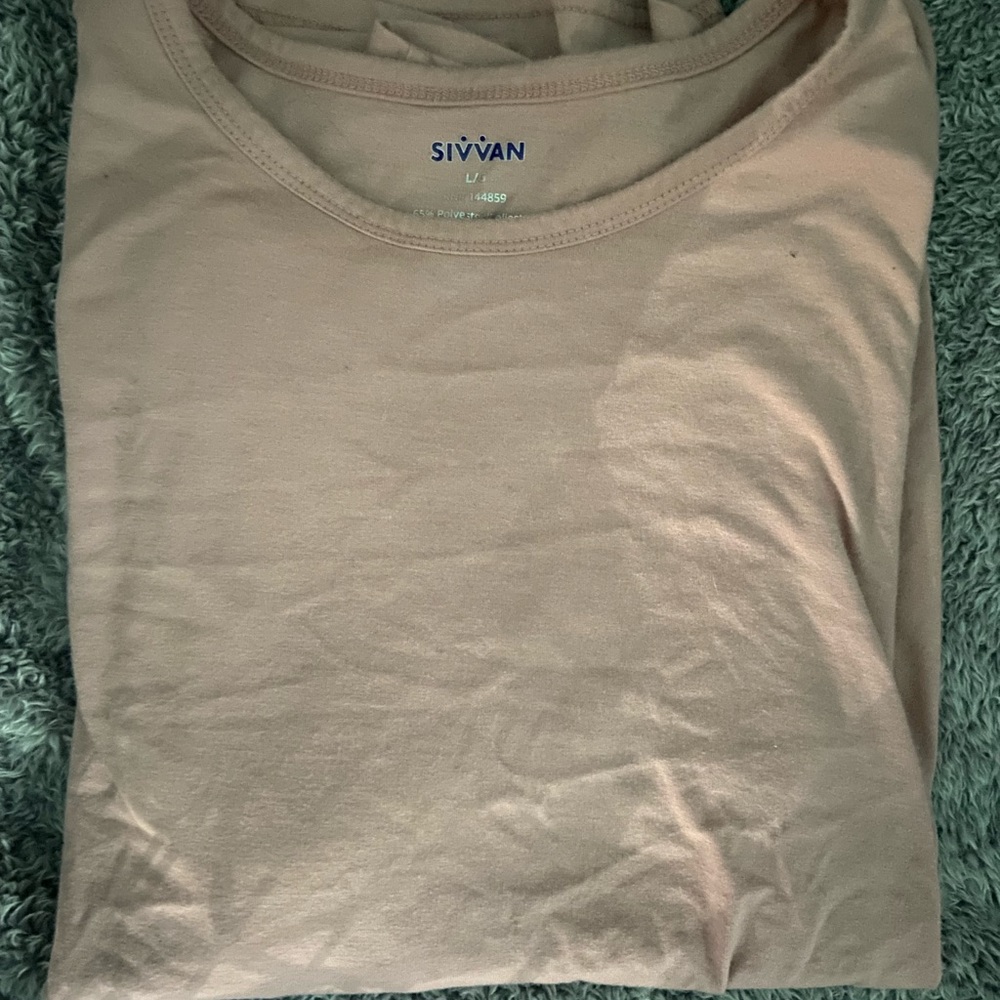 Pink long sleeve shirt.